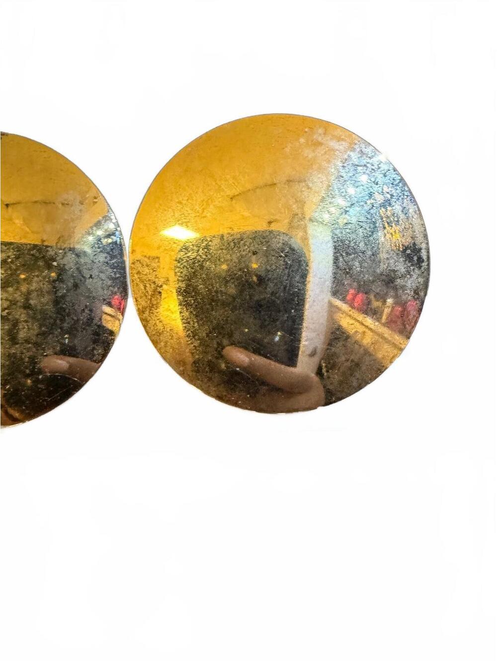 Large gold disc clip earrings